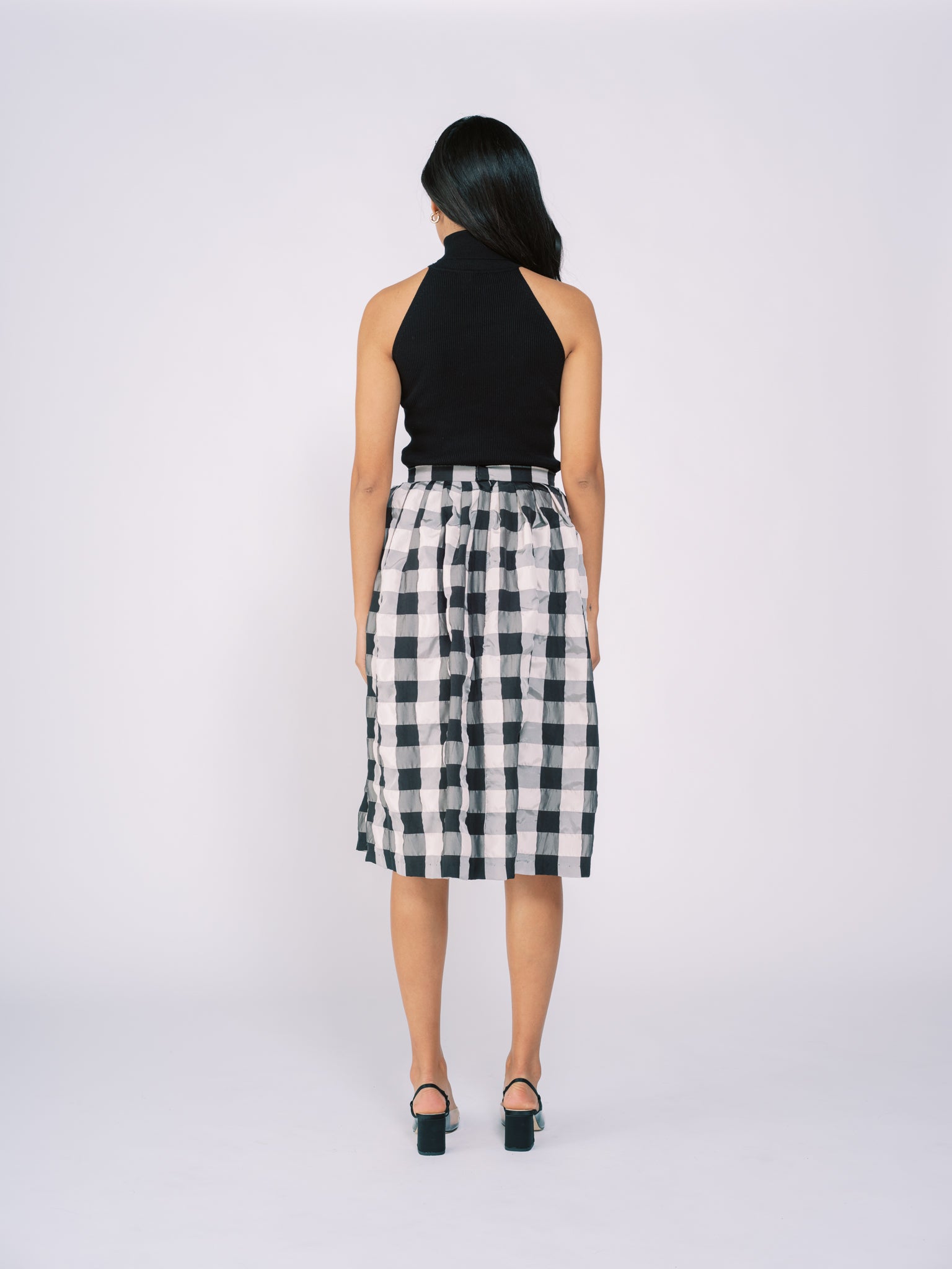 Pleated Midi Skirt in Black and White Checkered Pattern
